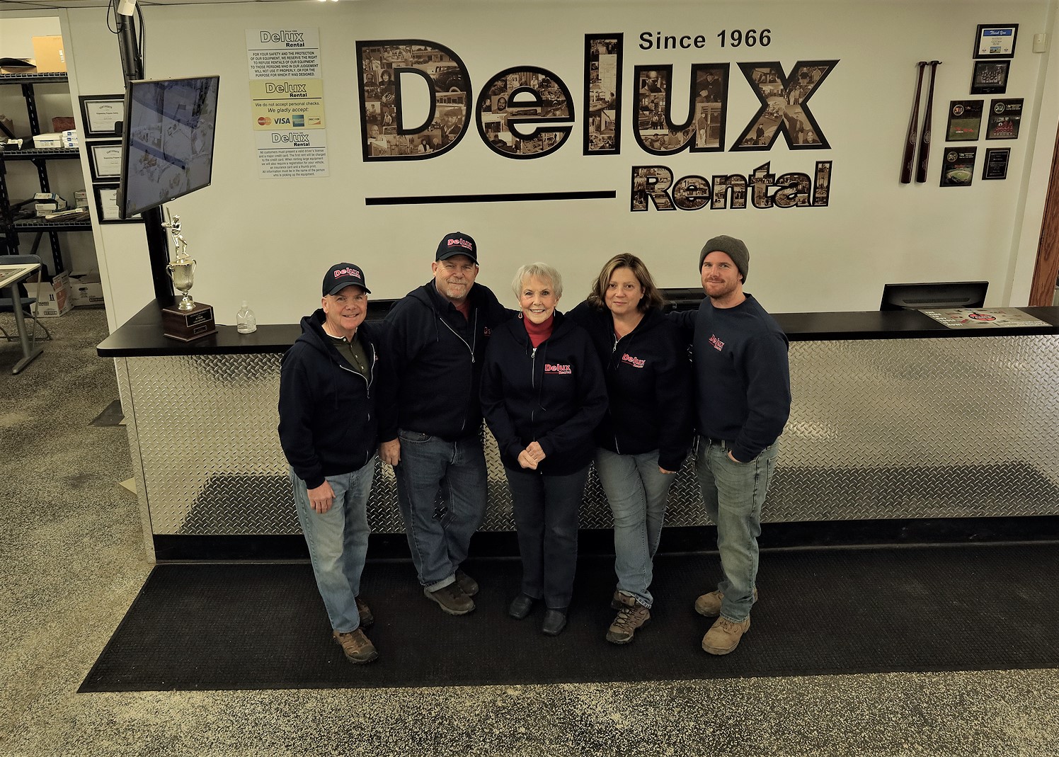 Delux Rental team at front desk